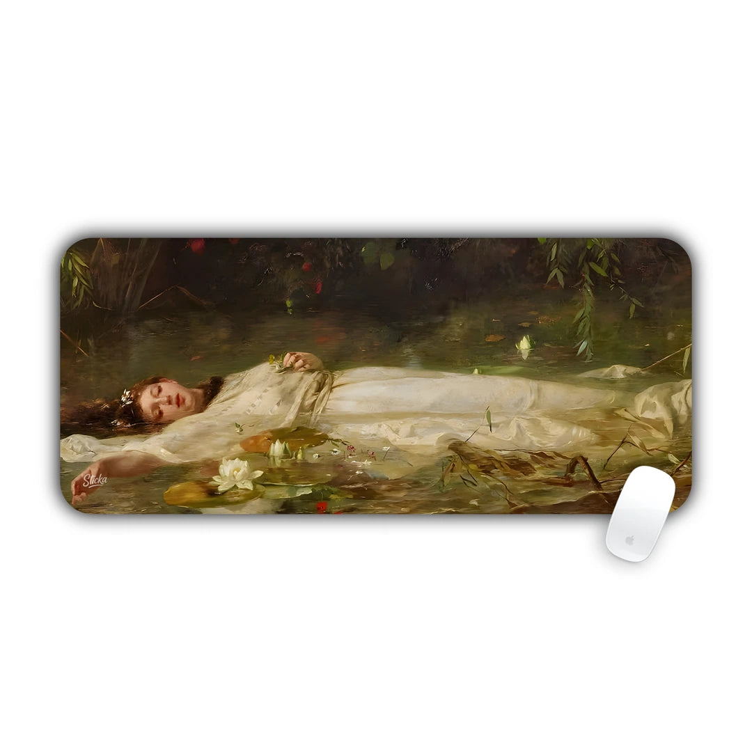 Classical oil painting of Ophelia floating peacefully in dark water surrounded by flowers desk pad 70x30