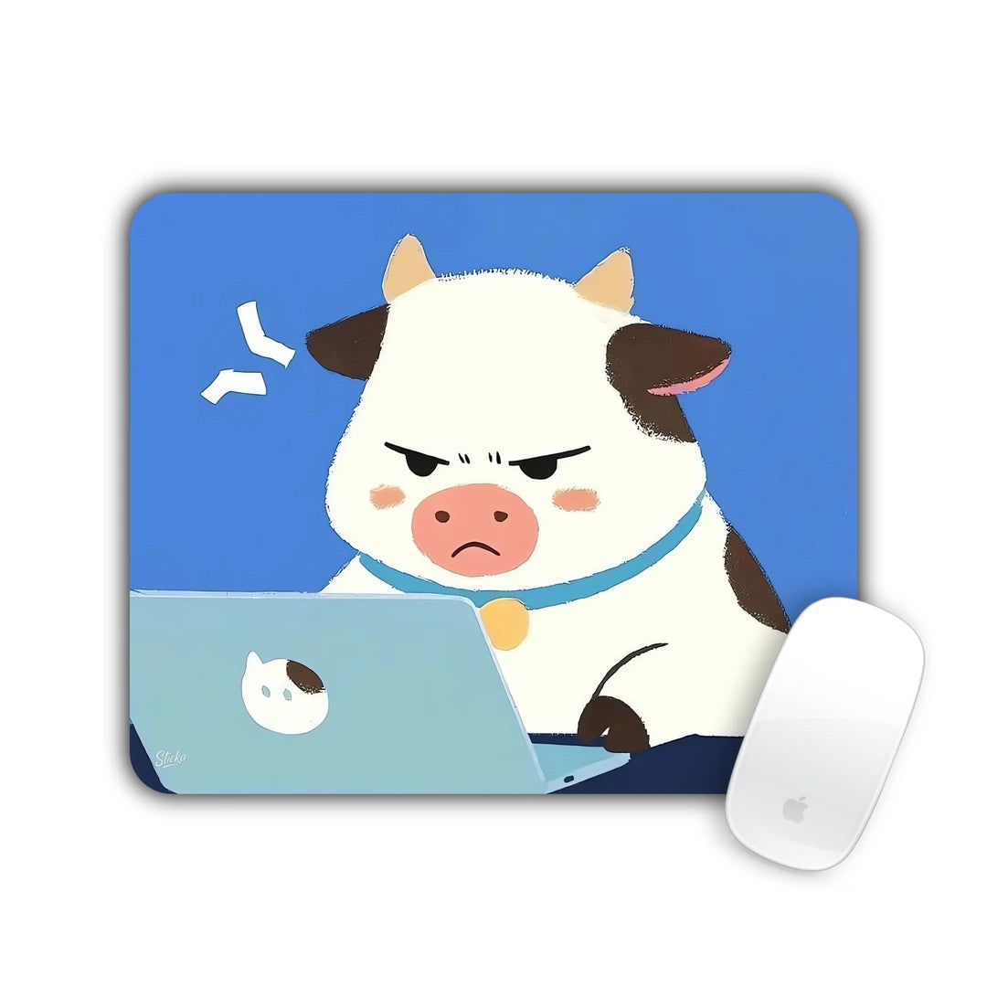 Annoyed cartoon cow working on a laptop on a blue background mouse pad 23x19