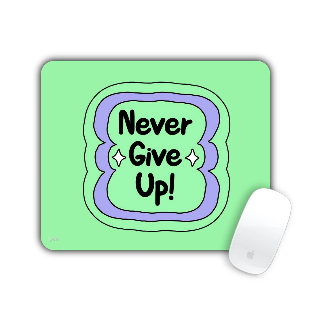 'Never Give Up!' lettering in a wavy purple frame on mint green mouse pad 23x19