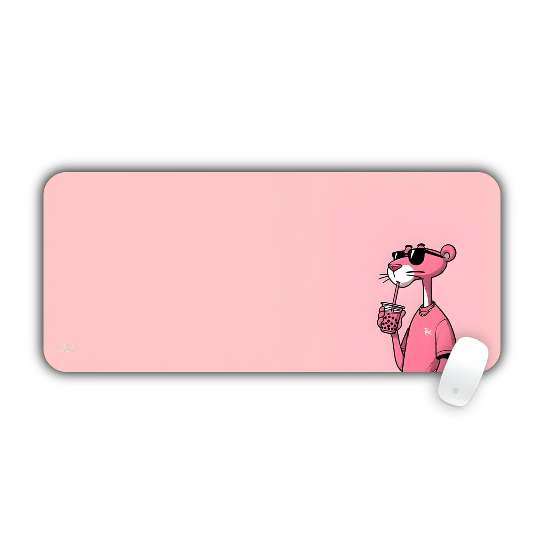 Pink Panther in sunglasses sipping a drink on minimalist pink background desk pad 70x30