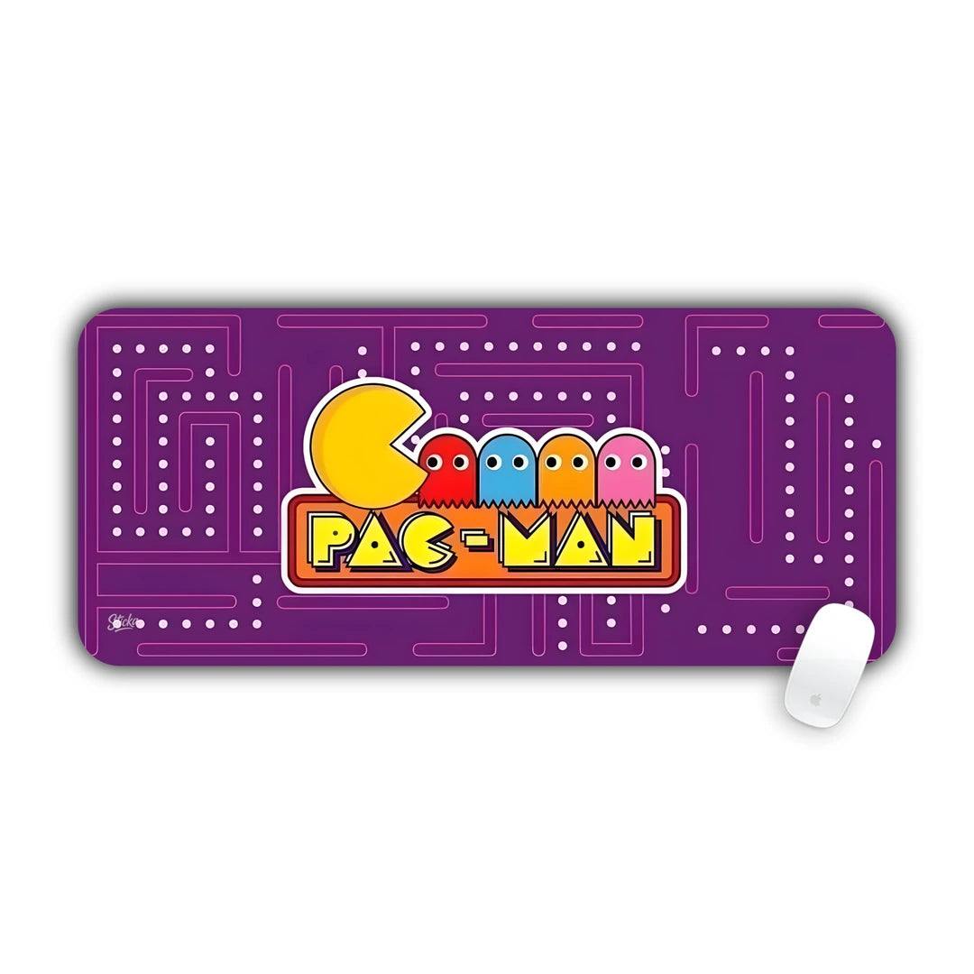 Pac-Man arcade maze with colorful ghosts and classic logo on purple desk pad 70x30