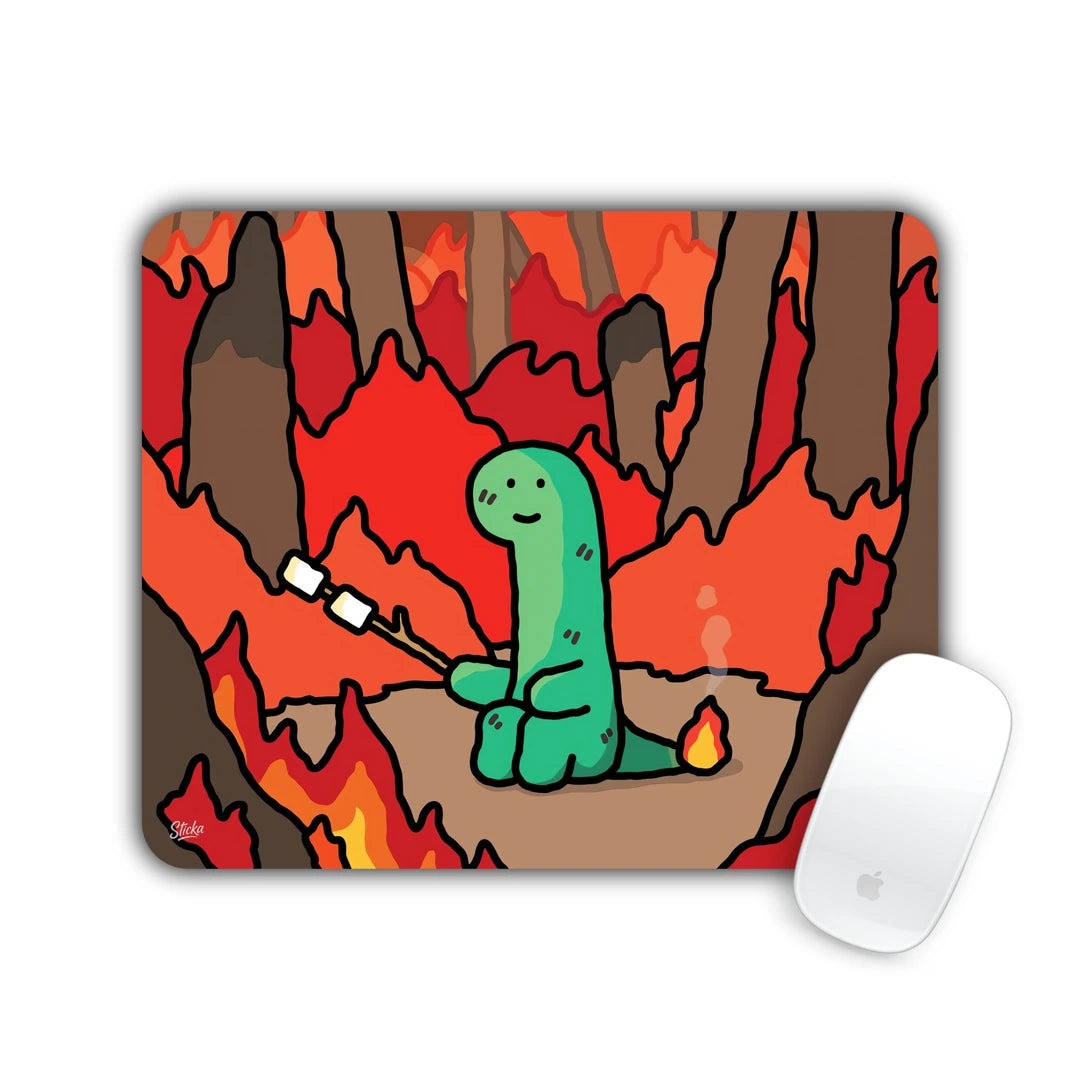 Cute green dinosaur roasting a marshmallow in a burning forest mouse pad 23x19