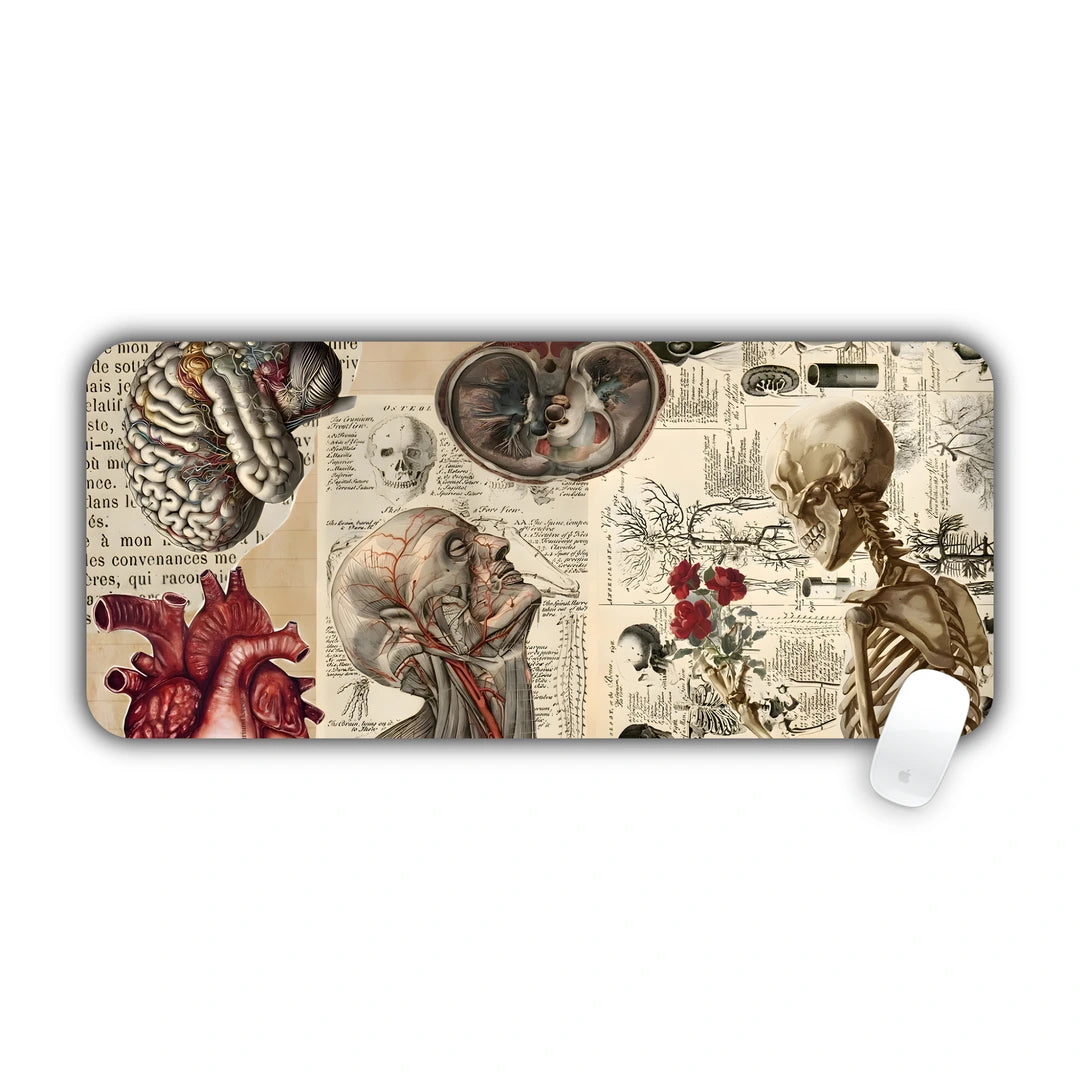 Old anatomy book pages with heart, skeleton and head drawings desk pad 70x30