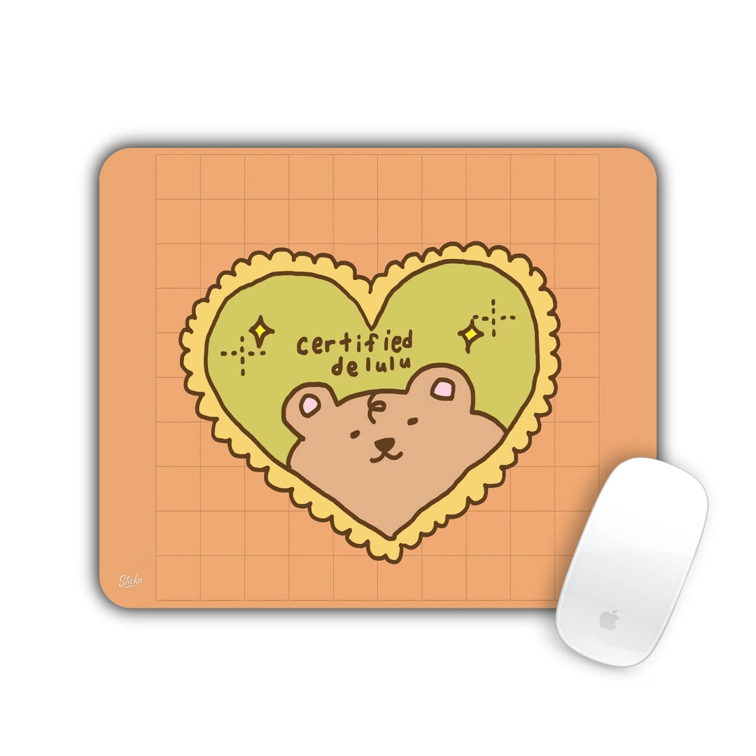 Cute bear inside a heart with the text certified delulu on orange grid mouse pad 23x19