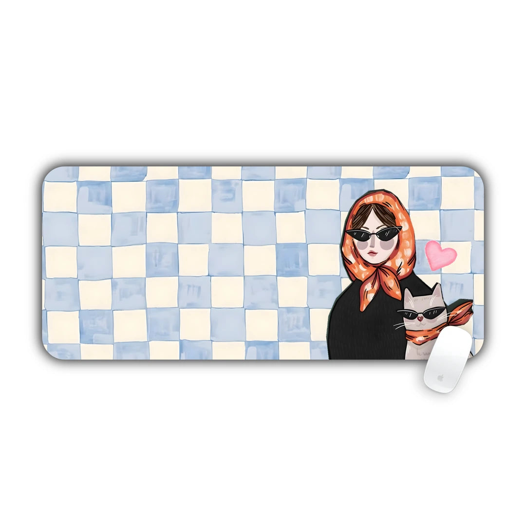Watercolor blue checkered background with a woman in sunglasses holding a cat desk pad 70x30