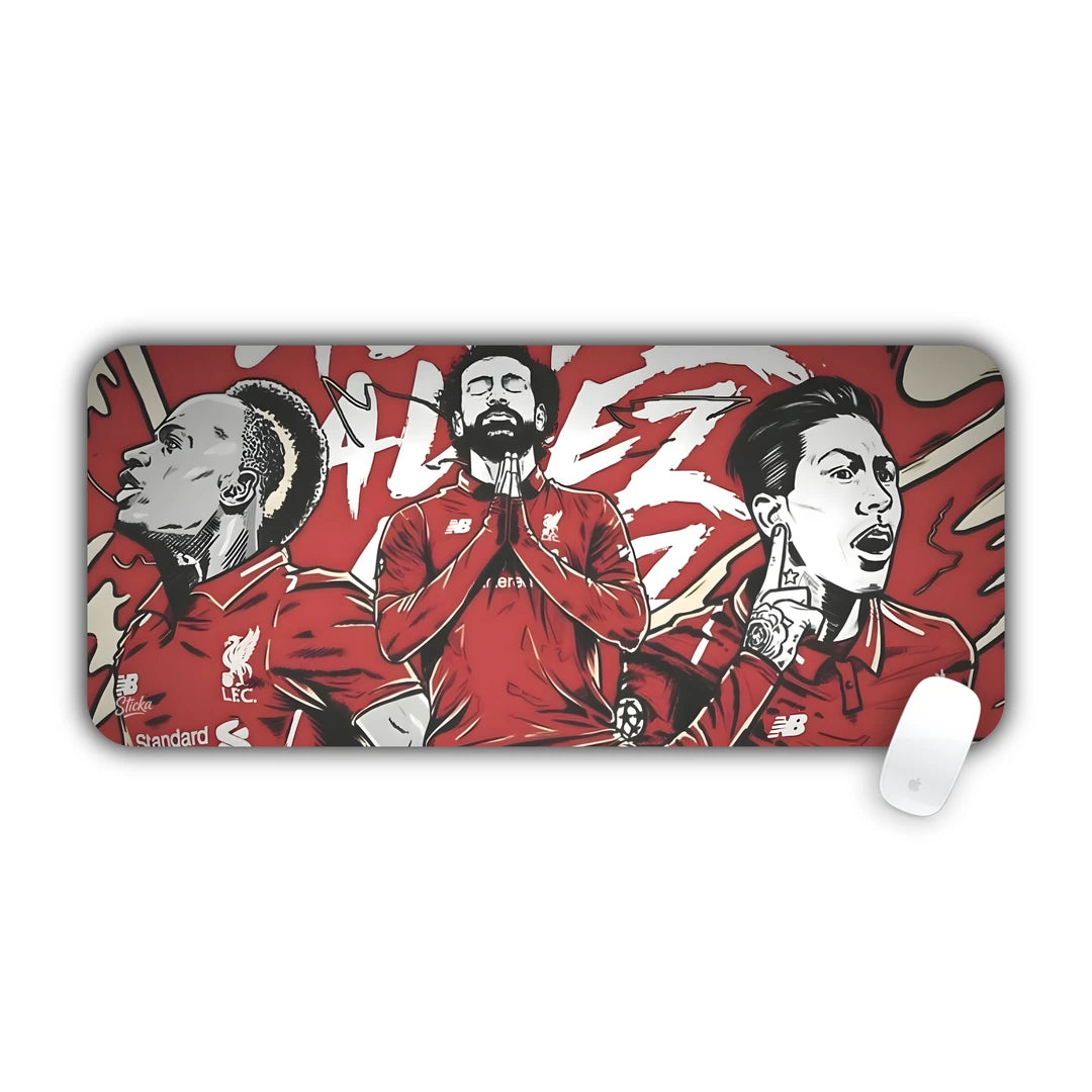 Illustrated three football players in red kits celebrating desk pad 70x30