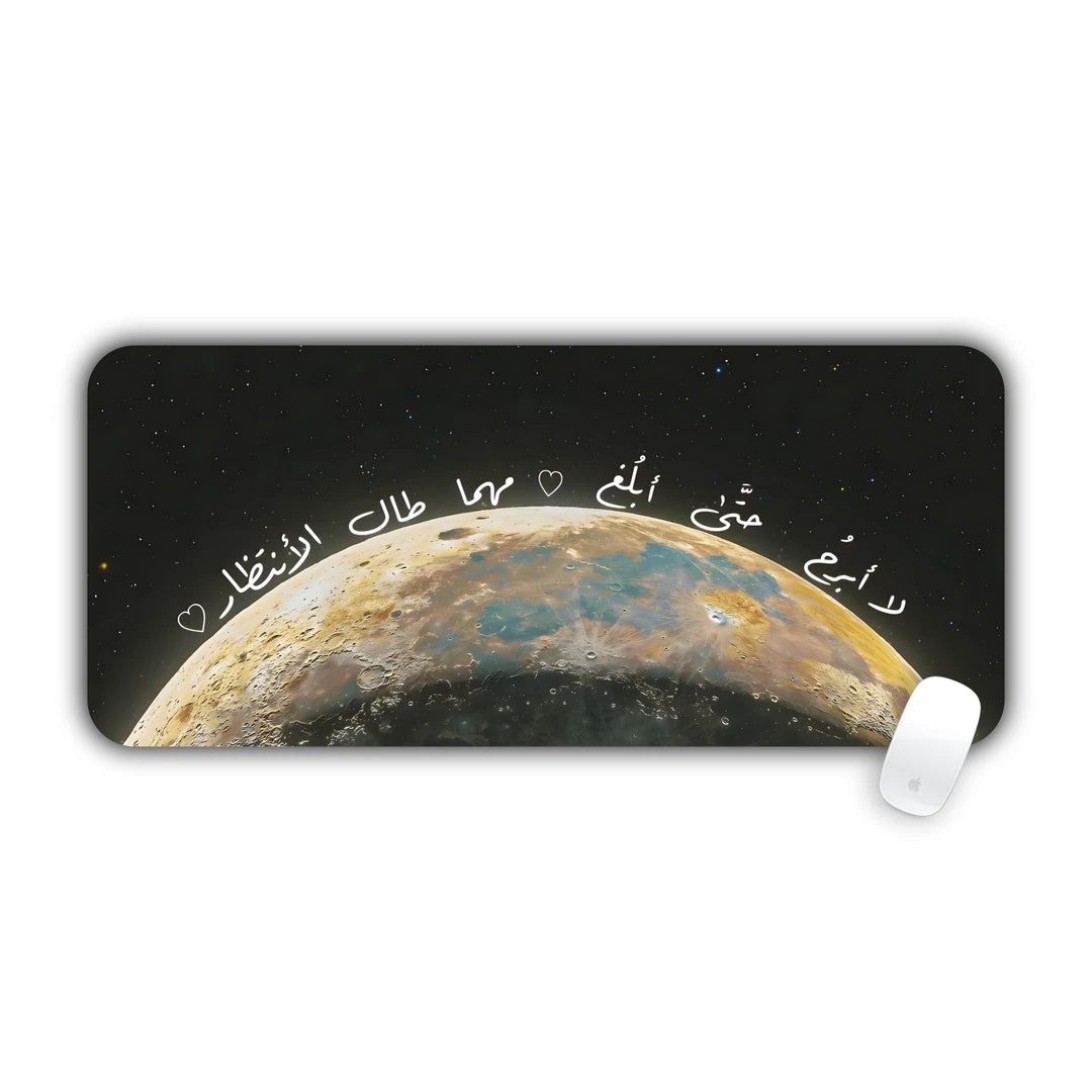Half moon in a dark sky with an Arabic text line desk pad 70x30