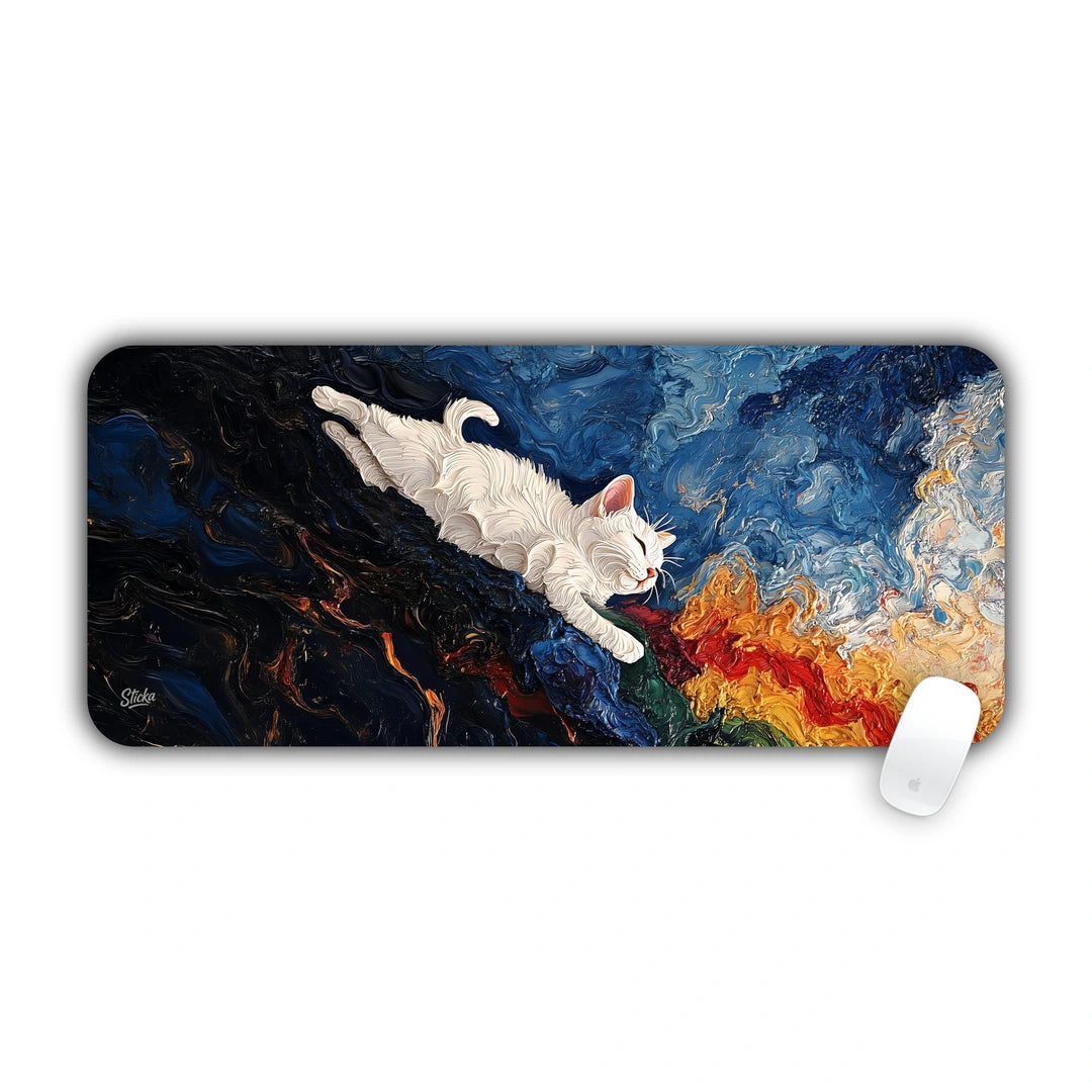 White kitten floating peacefully across a swirling Starry Night style cosmic sky desk pad 70x30