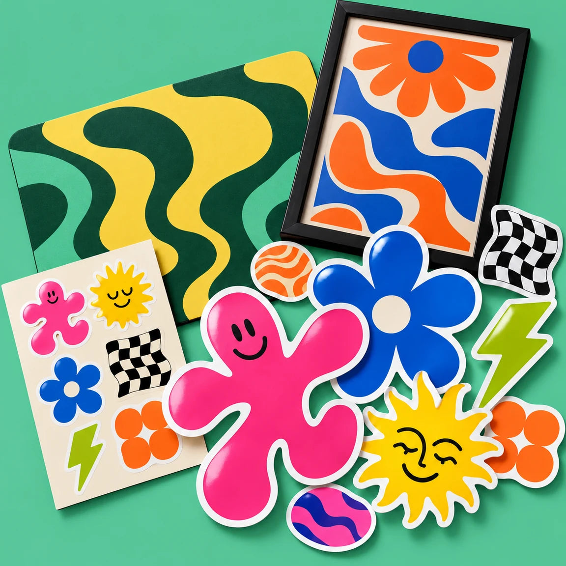 Custom stickers, a sticker sheet, an unstitched desk pad and a framed print