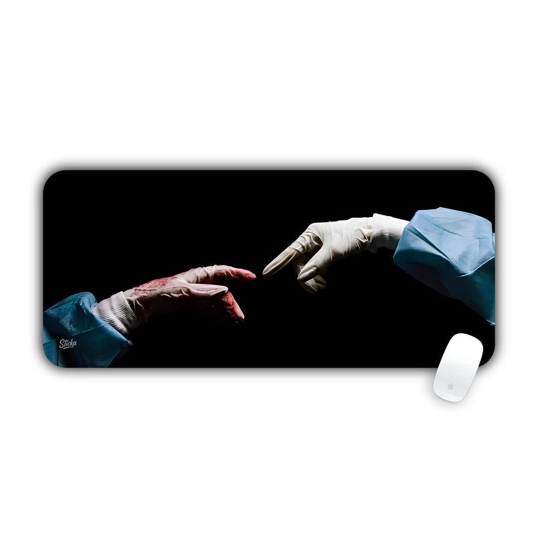 Medical interpretation of Creation of Adam with gloved surgeon hands touching against black desk pad 70x30