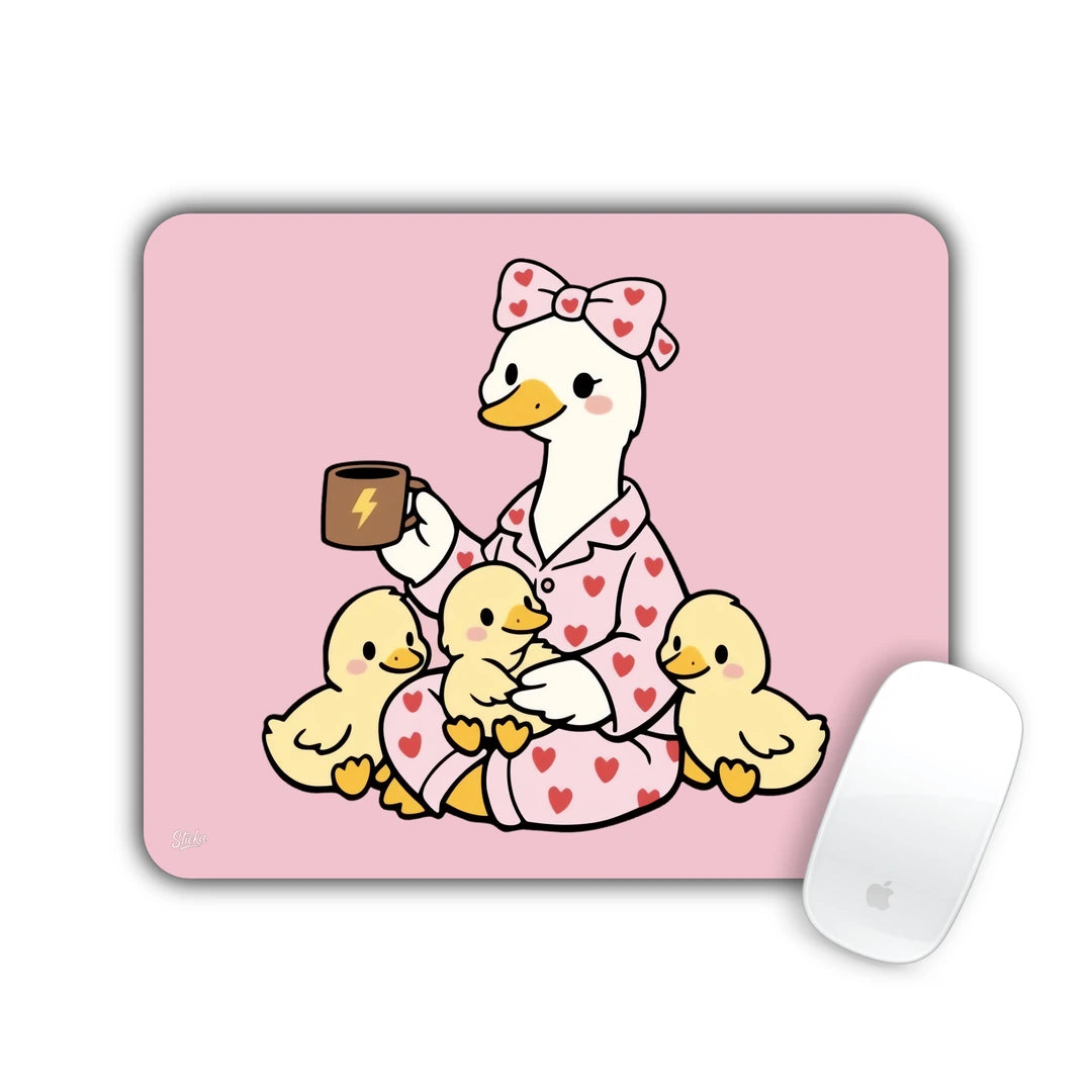 Duck in heart pajamas holding coffee surrounded by yellow ducklings on pink mouse pad 23x19