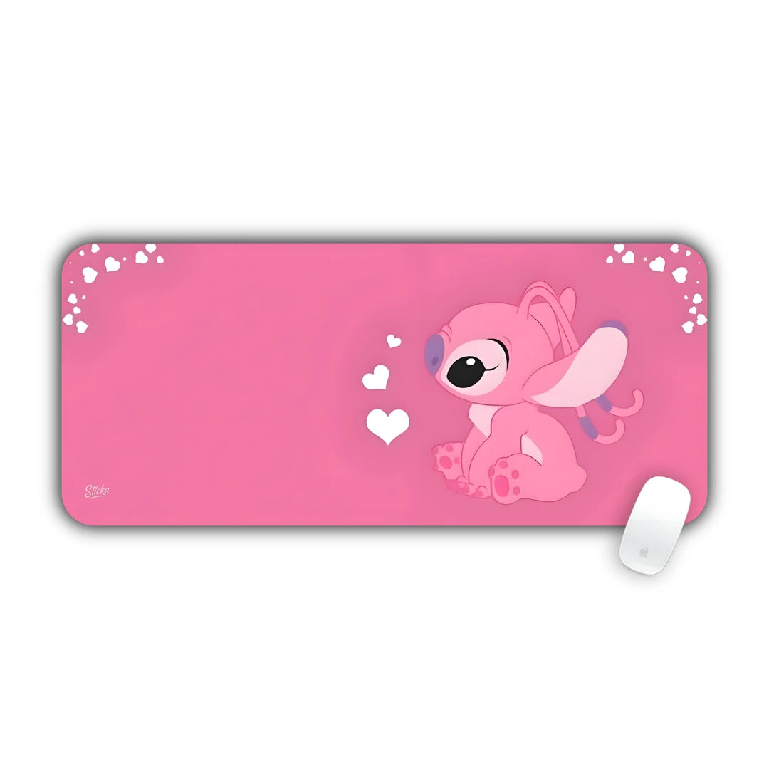 Pink alien Angel from Lilo and Stitch surrounded by hearts on pink backdrop desk pad 70x30