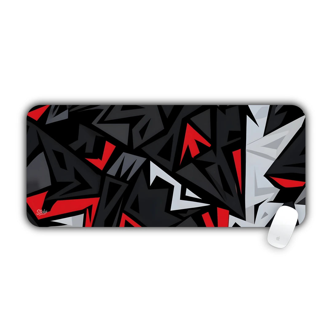 Modern abstract geometric pattern with sharp angular shapes in black, white, and red desk pad 70x30